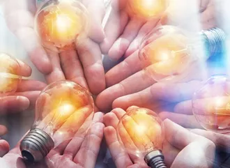 People handing in their ideas