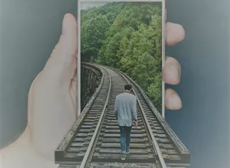 A man walking off into the distance on a phone screen
