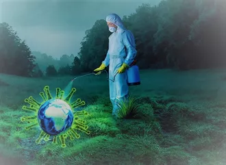 A man in a white protective suit spraying chemicals
