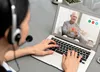 A medical professional carrying out a consultation over video chat